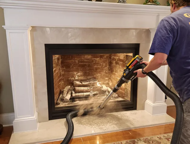 Fireplace cleaning performed by Millbury Chimney Sweep in Millbury, MA