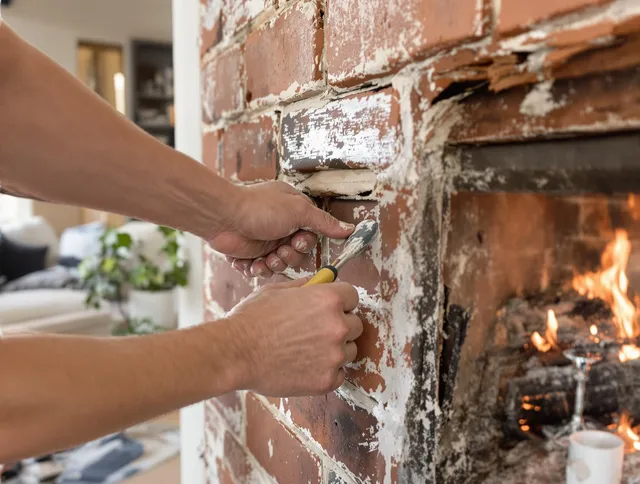 Routine fireplace repair by Millbury Chimney Sweep in Millbury, MA